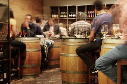 Blurred view of a bar interior, simulating the perspective of an intoxicated person