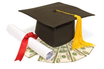 A black graduation cap, a rolled diploma tied with a ribbon, and several dollar bills arranged on a flat surface